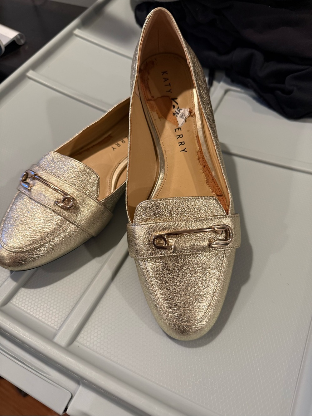 Katy Perry Collections metallic gold loafer flats with buckle hardware